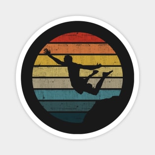 Cliff Diving Silhouette On A Distressed Retro Sunset print Magnet